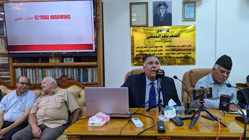 May be an image of 5 people, people sitting, people standing and indoor